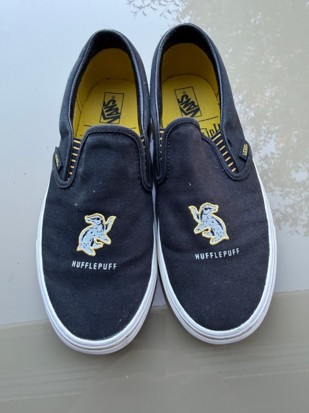 Vans Black & Yellow Hufflepuff Slip-On Sneakers